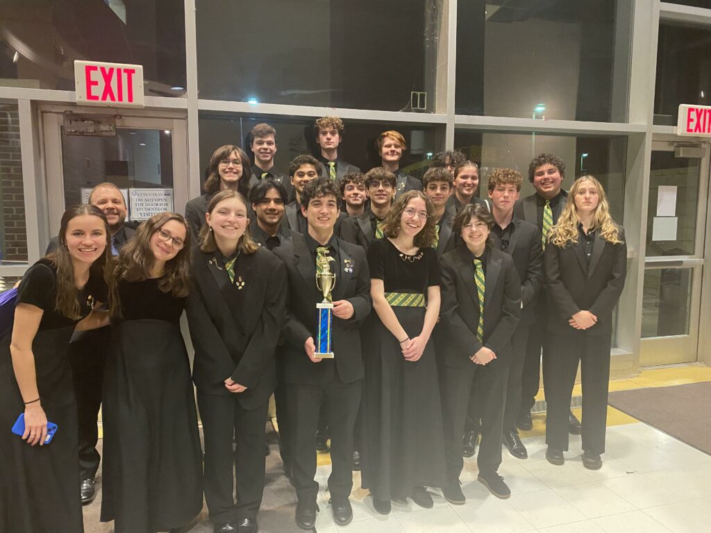 photo of jazz ensemble with trophy at state finals
