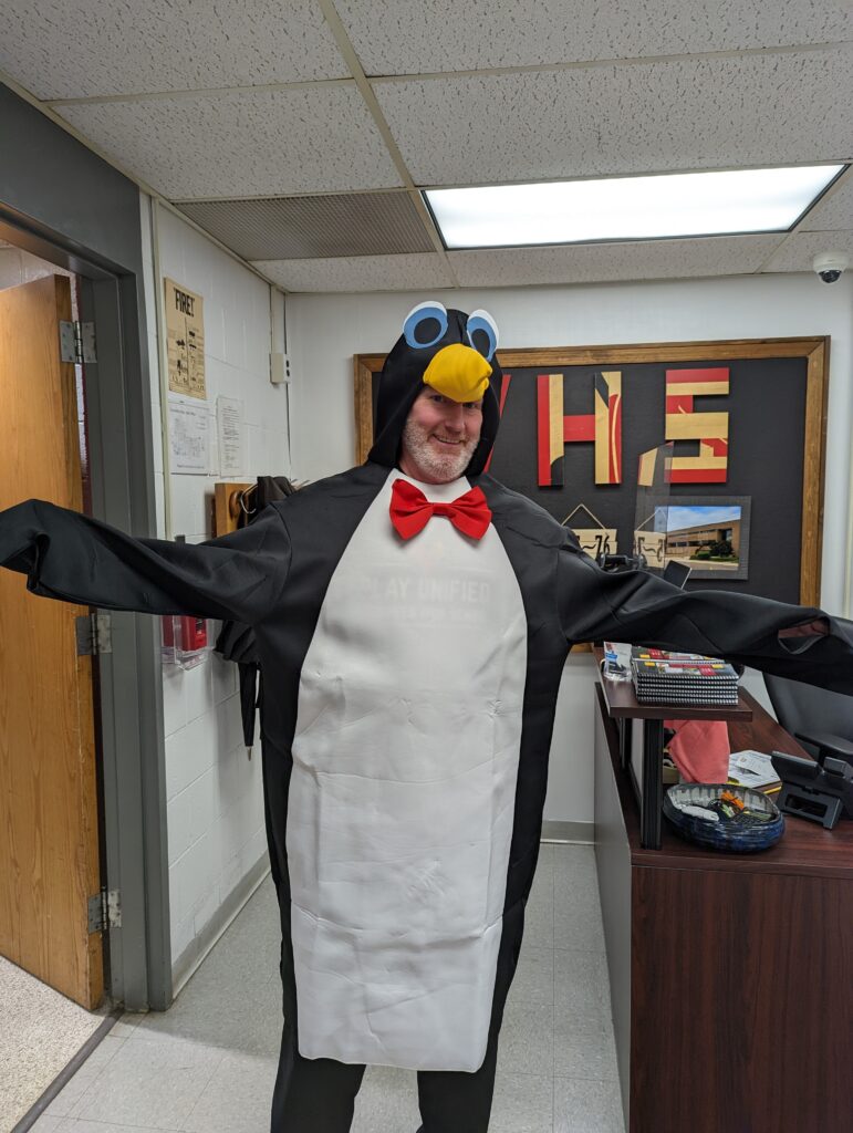 photo of Principal Peterson in penguin costume